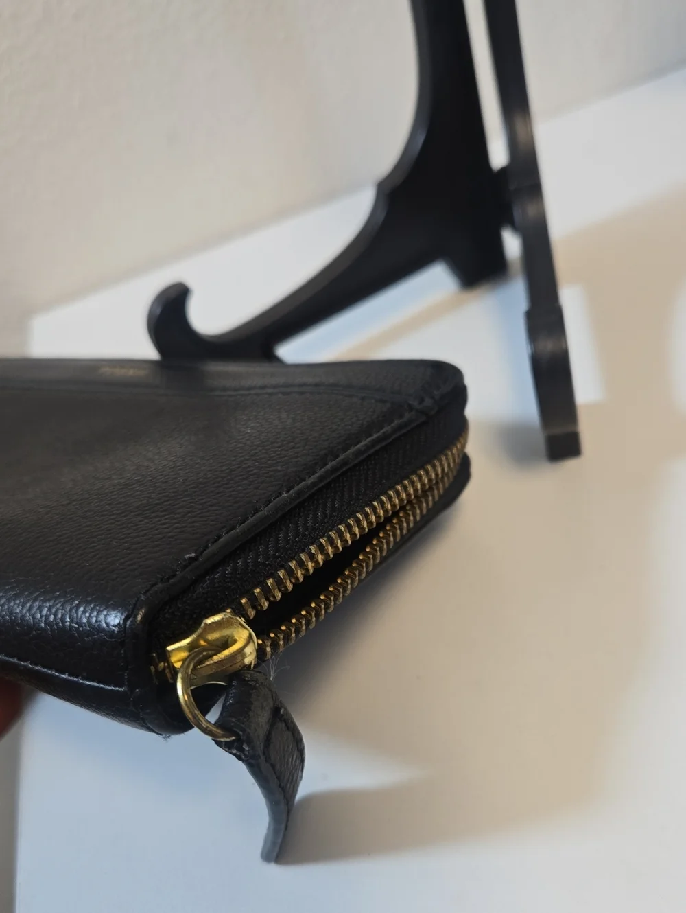 Fossil Black Leather Zip-Around Wallet with Gold Logo